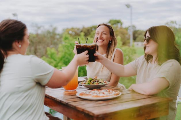 Women doing cheers