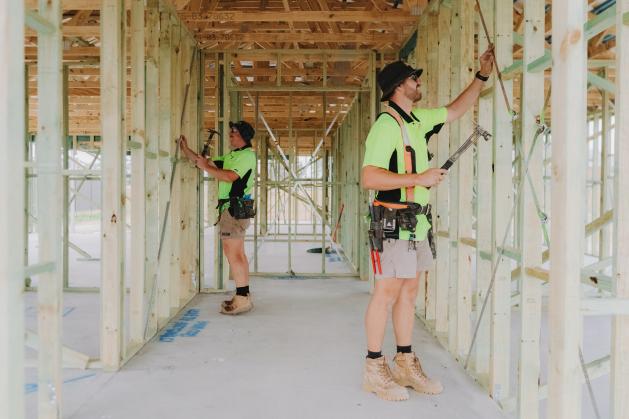 Building a wooden house frame